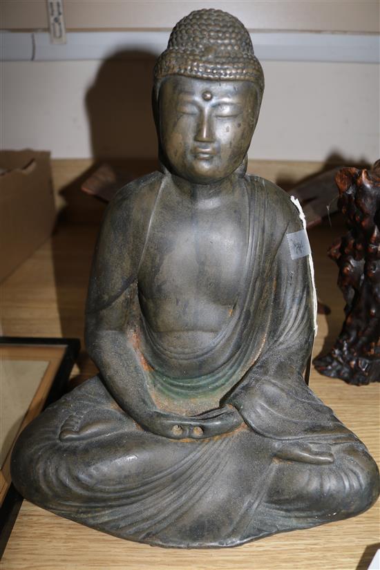 A Chinese rootwood vase, a carved Buddha and a Koran stand (3)